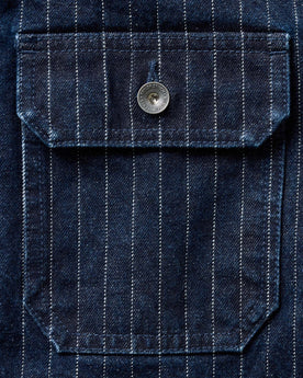 material shot of the pocket on The Fremont Jacket in Rinsed Indigo Dobby Denim, Outerwear by Taylor Stitch