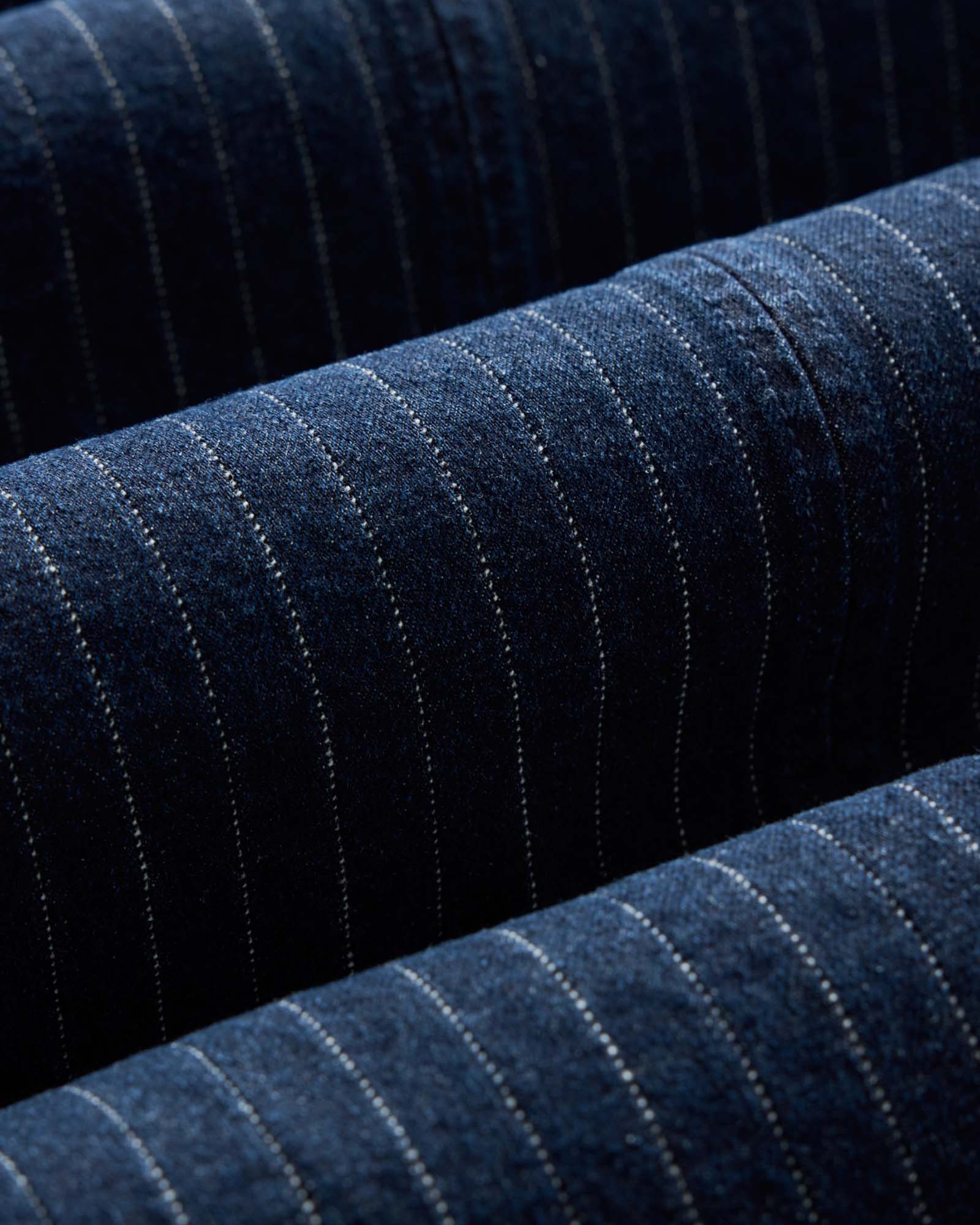 material shot of the fabric on The Fremont Jacket in Rinsed Indigo Dobby Denim, Outerwear by Taylor Stitch