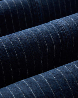 material shot of the fabric on The Fremont Jacket in Rinsed Indigo Dobby Denim, Outerwear by Taylor Stitch