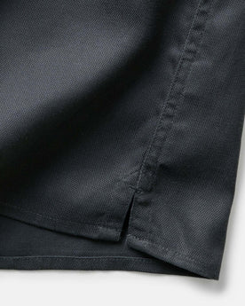 material shot of the hem on The Hawthorne Shirt in Asphalt, Wovens by Taylor Stitch