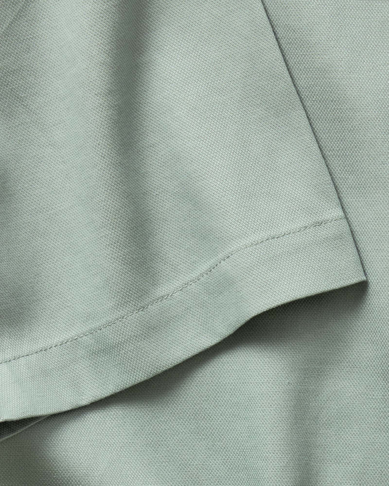 material shot of the sleeve on The Hawthorne Shirt in Surf Green, Wovens by Taylor Stitch