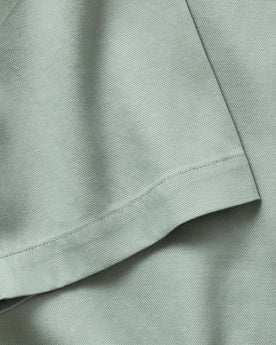 material shot of the sleeve on The Hawthorne Shirt in Surf Green, Wovens by Taylor Stitch