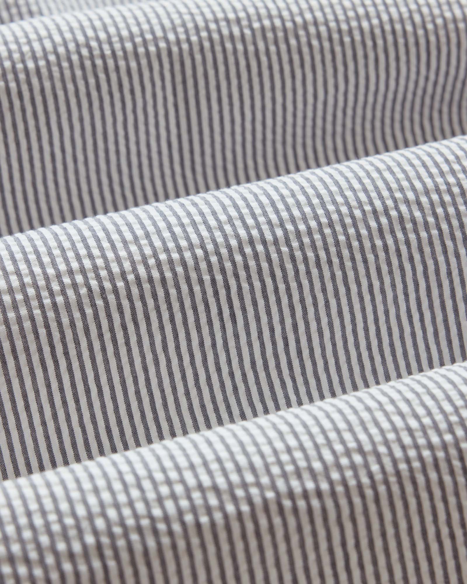 material shot of the fabric on The Jack in Navy Stripe Seersucker, Wovens by Taylor Stitch
