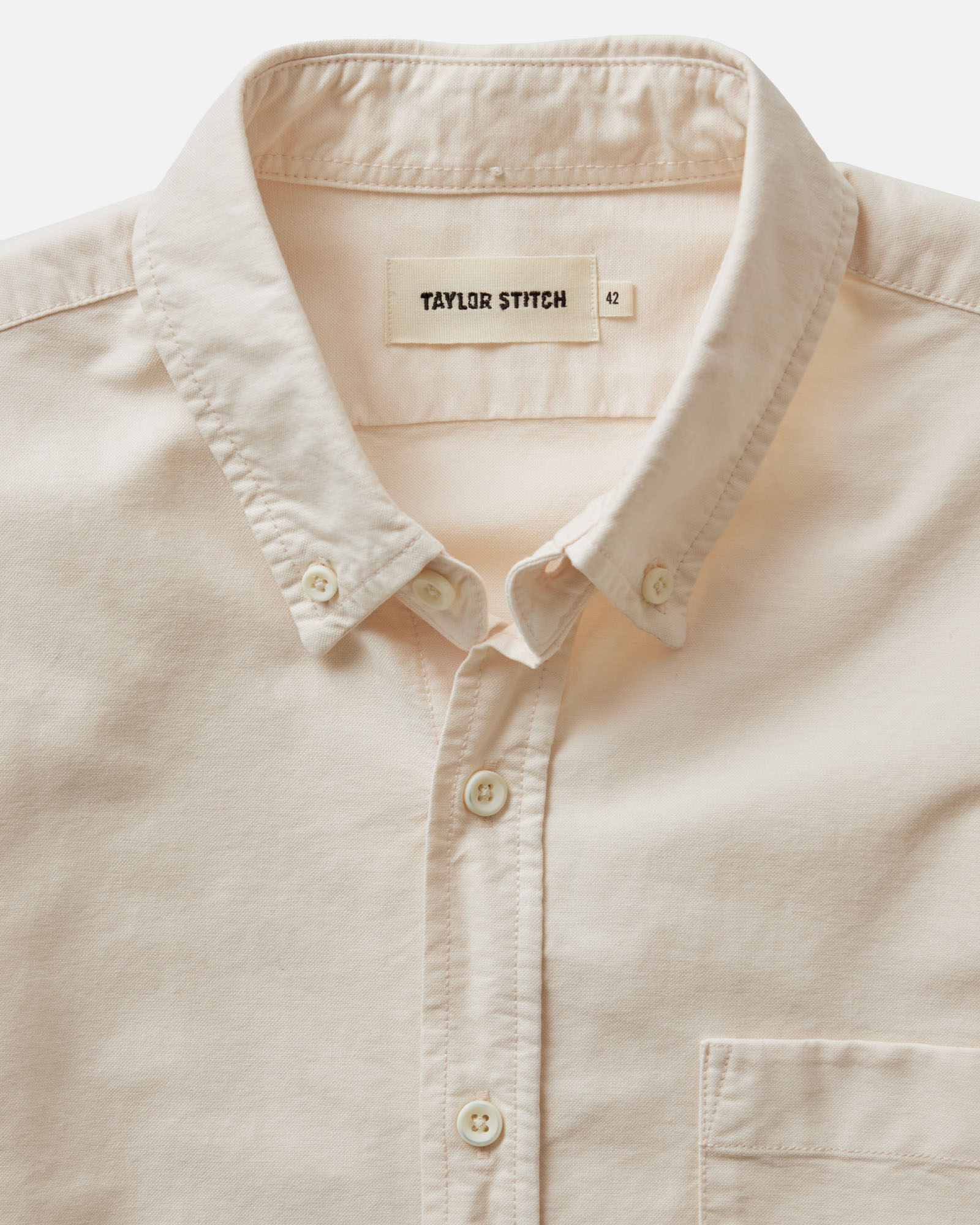 material shot of the collar on The Jack in Pale Rose Oxford, Wovens by Taylor Stitch