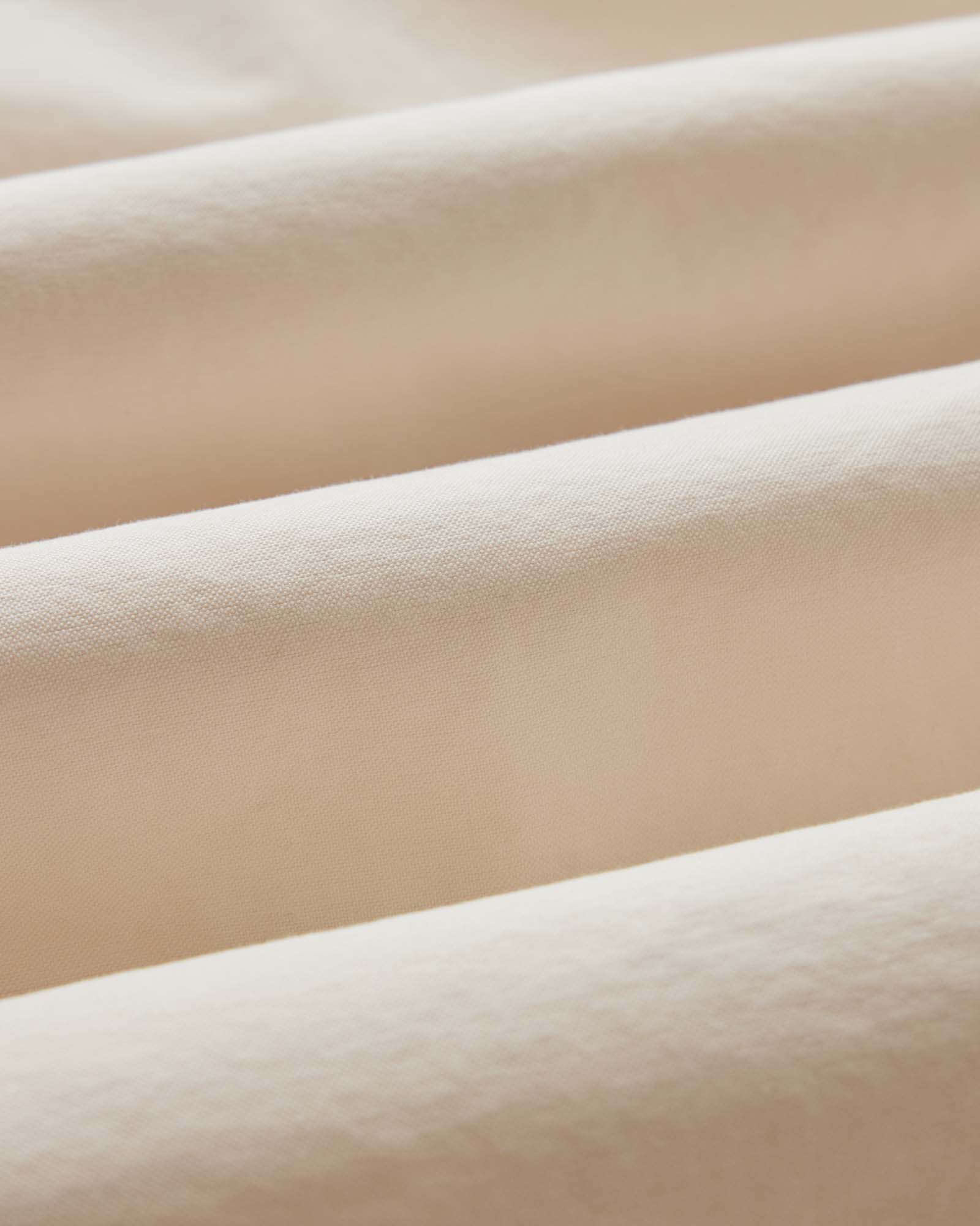 material shot of the fabric on The Jack in Pale Rose Oxford, Wovens by Taylor Stitch