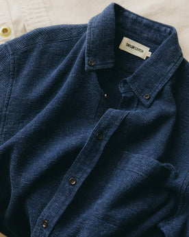 fit model walking down the stairs wearing The Jack in Indigo Waffle, Wovens by Taylor Stitch