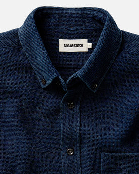 fit model showing off the buttons on The Jack in Indigo Waffle, Wovens by Taylor Stitch