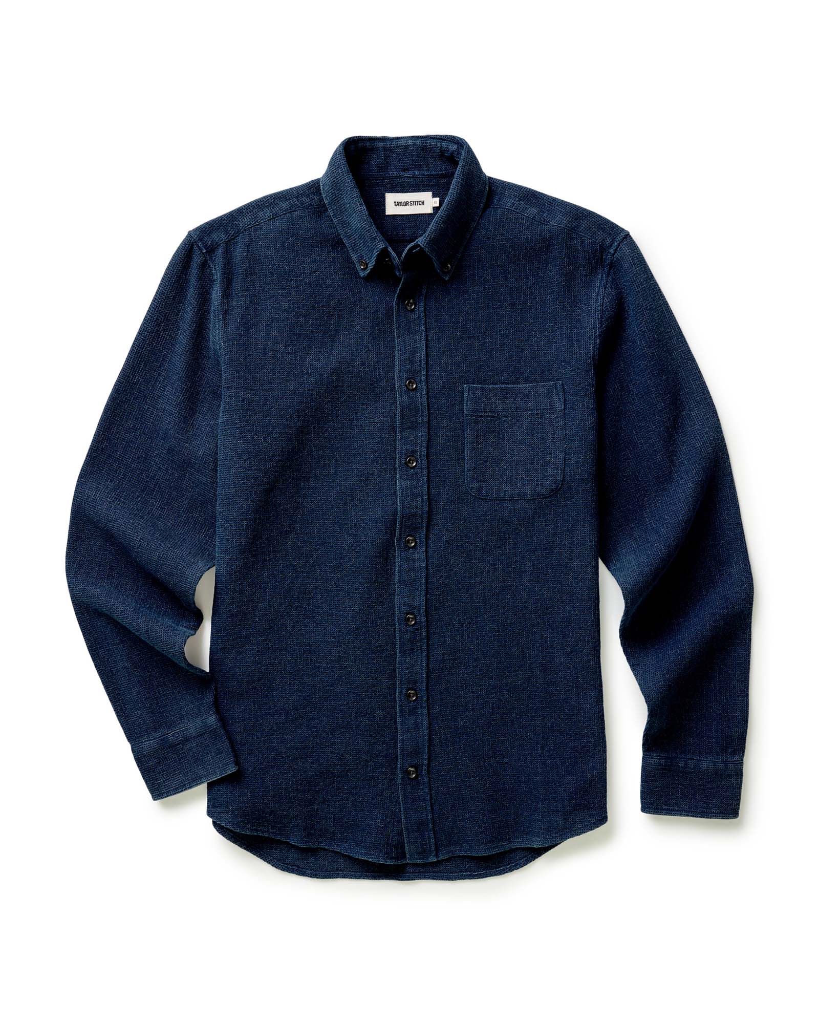 material shot of the buttons on material shot of the waffle fabric on The Jack in Indigo Waffle, Wovens by Taylor Stitch