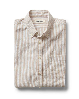 folded flatlay of The Jack in Sand Stripe Seersucker, Wovens by Taylor Stitch