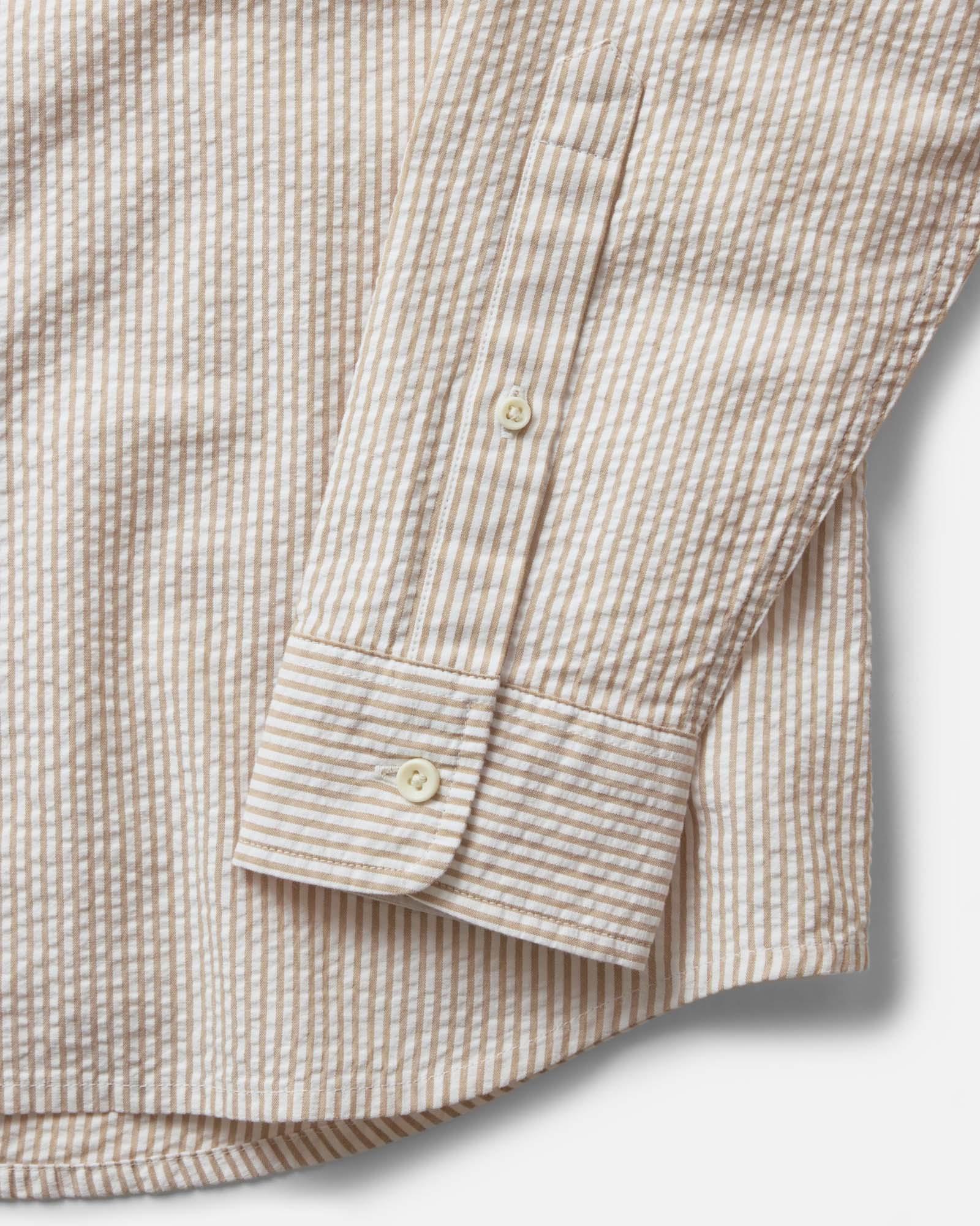 material shot of the sleeve on The Jack in Sand Stripe Seersucker, Wovens by Taylor Stitch