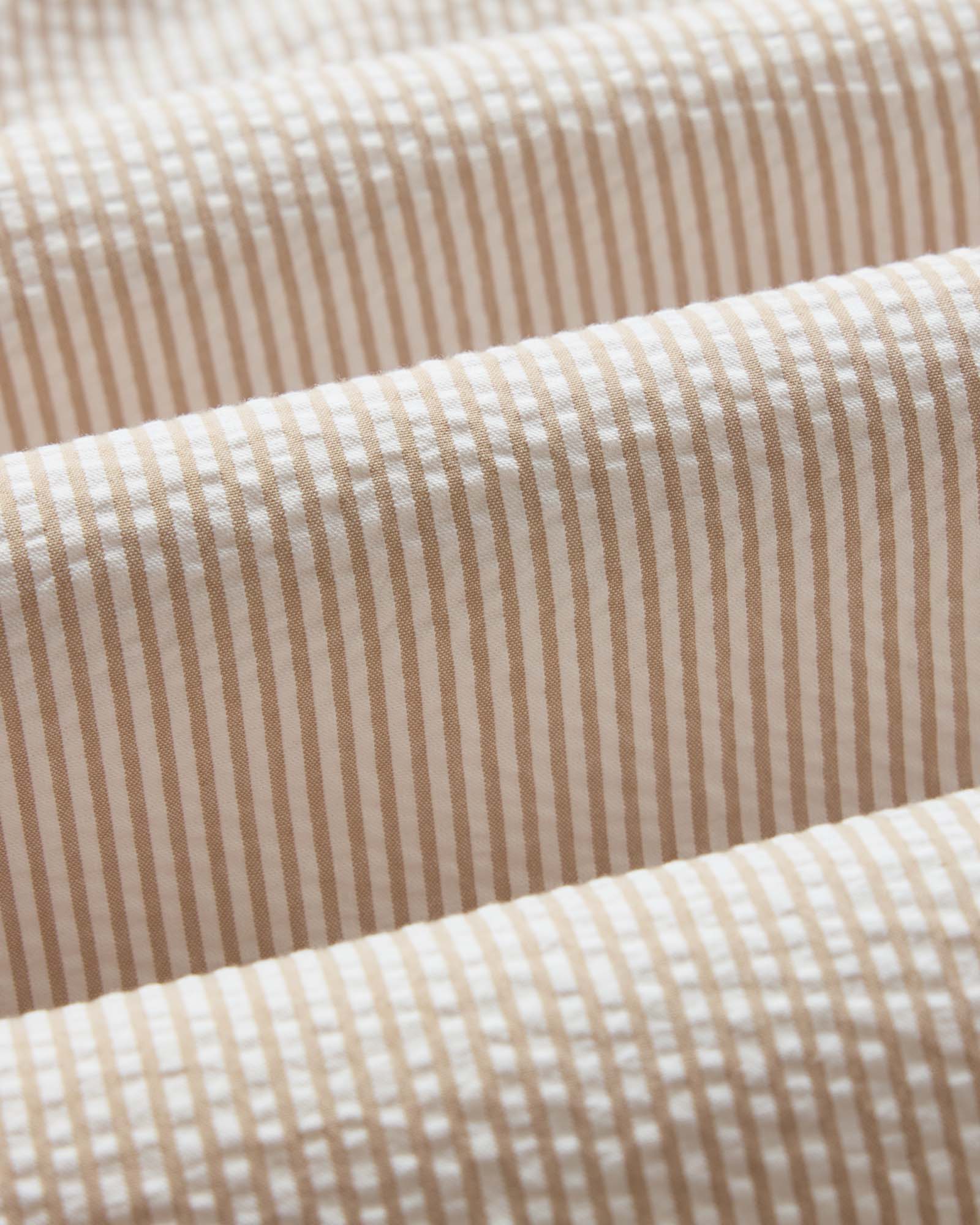 material shot of the fabric on The Jack in Sand Stripe Seersucker, Wovens by Taylor Stitch