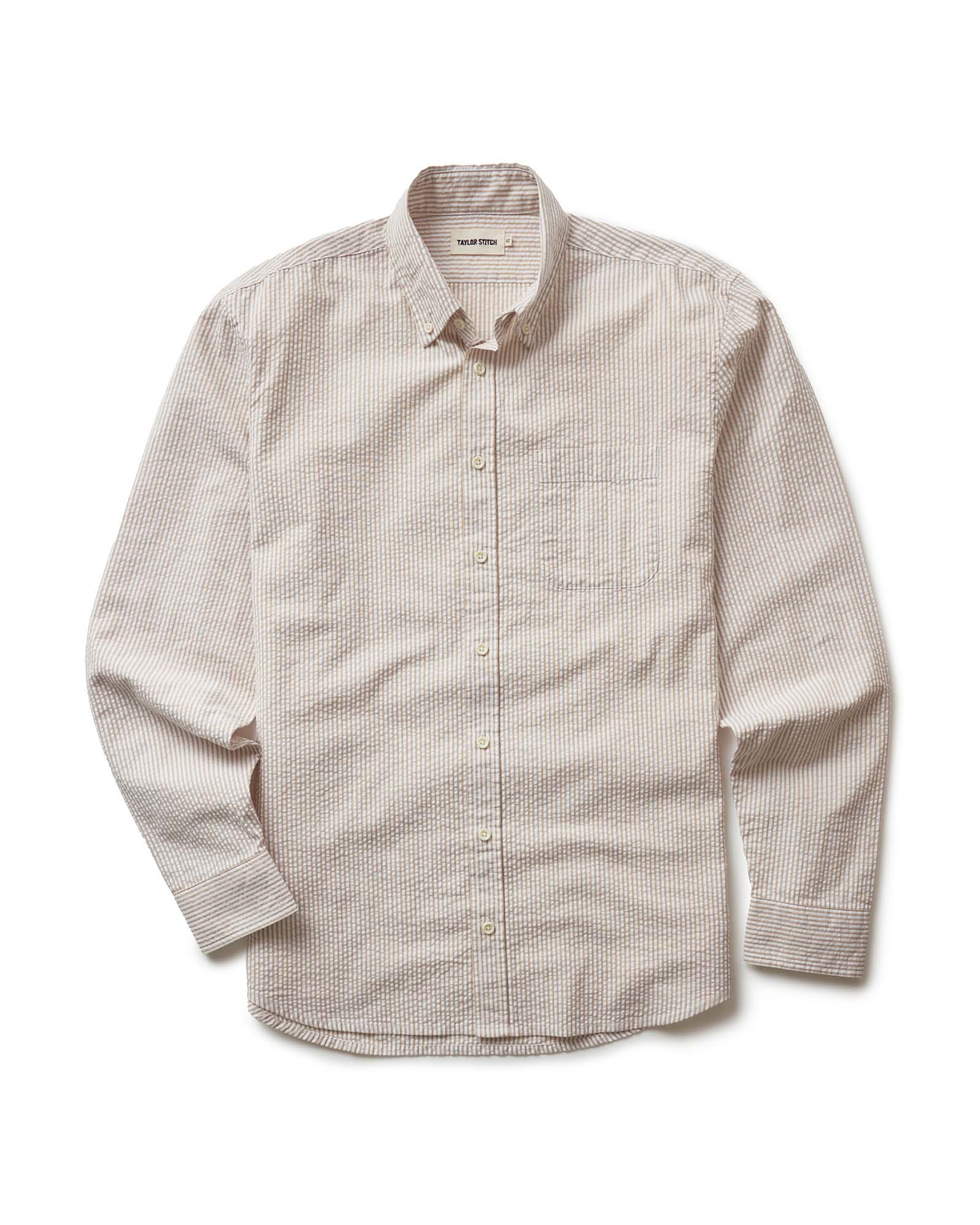 flatlay of The Jack in Sand Stripe Seersucker, Wovens by Taylor Stitch