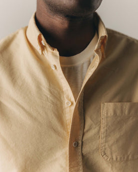 fit model showing off the collar on The Jack in Straw Oxford, Wovens by Taylor Stitch