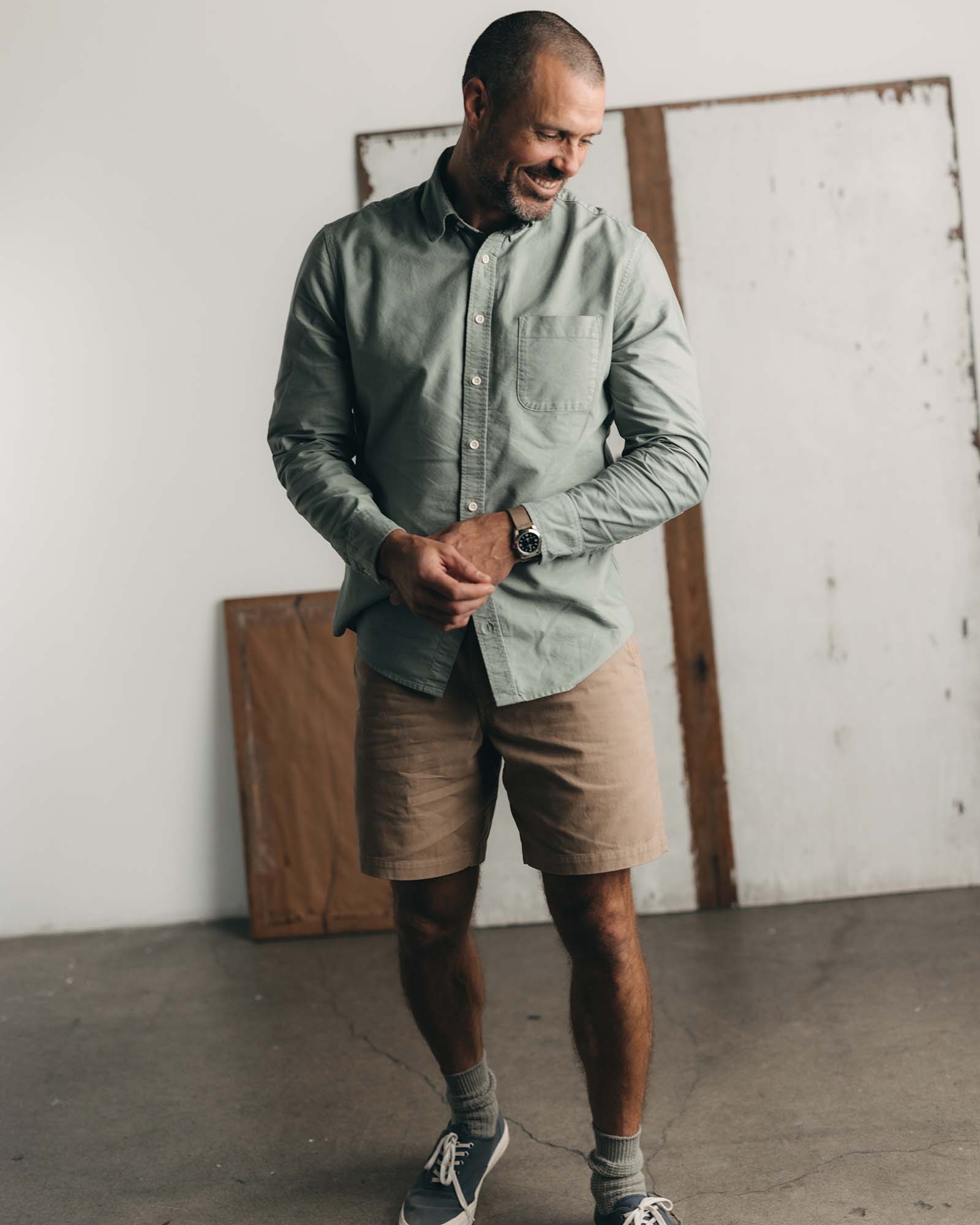 fit model posing in The Jack in Surf Green Oxford, Wovens by Taylor Stitch