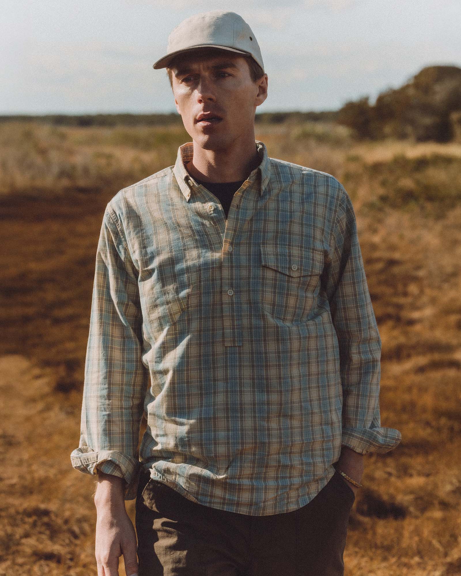 fit model showing off The Logan Popover in Blue Sky Plaid, Wovens by Taylor Stitch