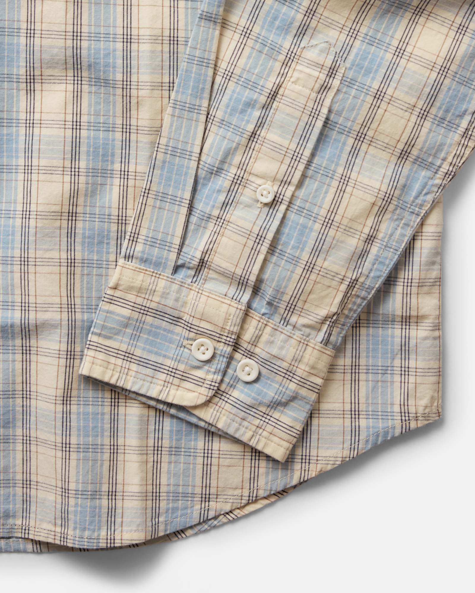 material shot of the sleeve on The Logan Popover in Blue Sky Plaid, Wovens by Taylor Stitch