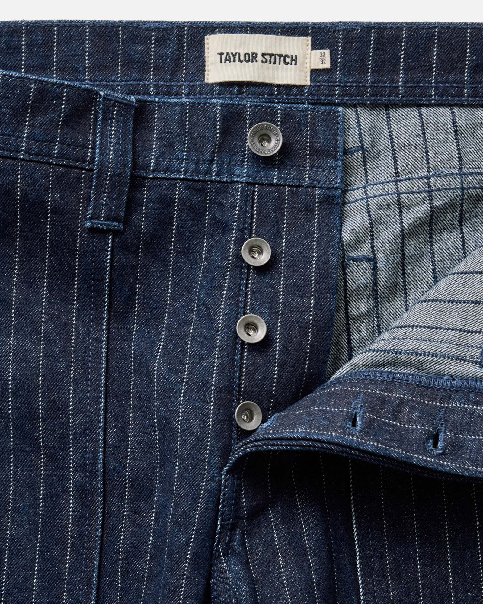 material shot of the button fly on The Mariner Jean in Rinsed Indigo Dobby Denim, Bottoms by Taylor Stitch