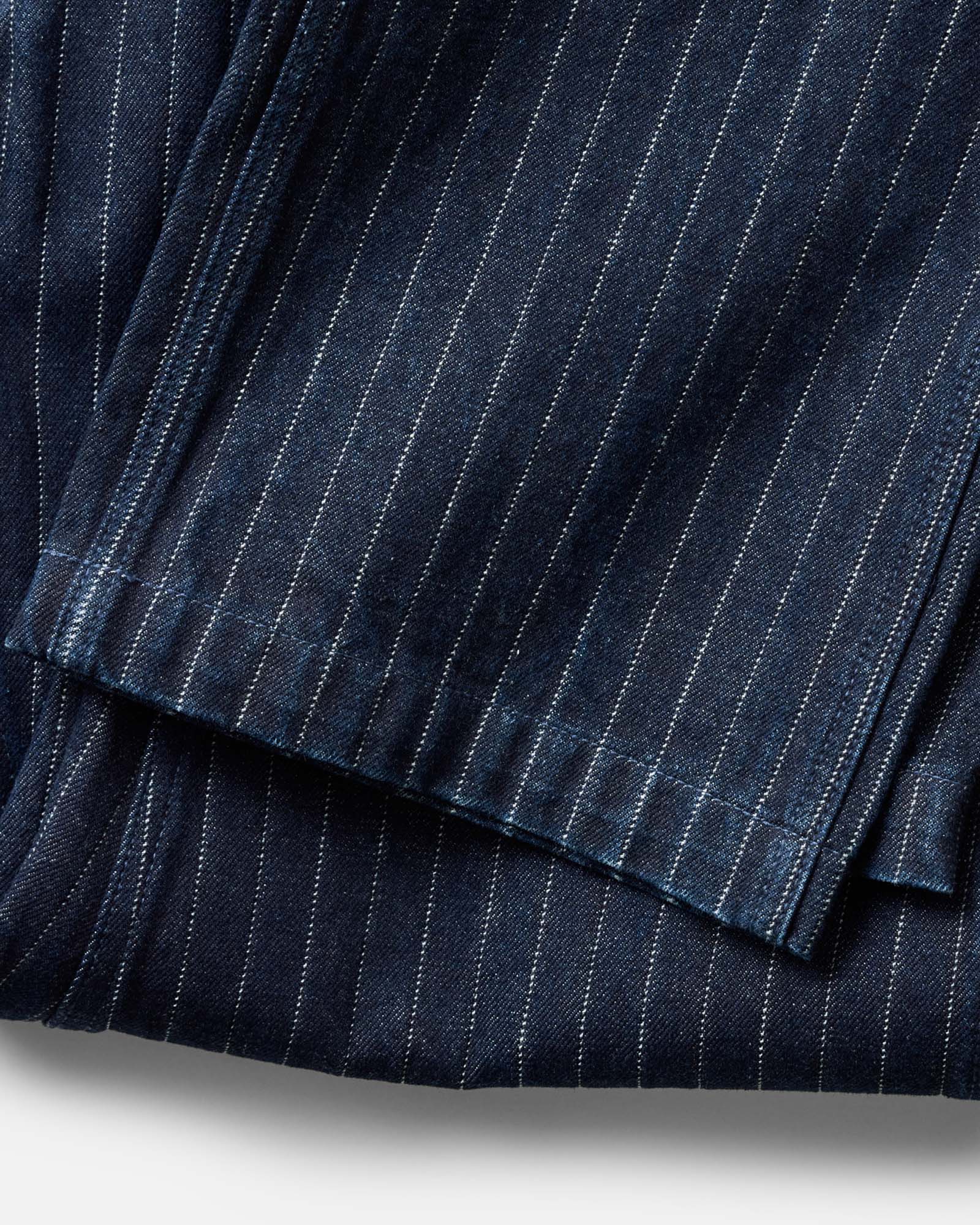 material shot of the cuff on The Mariner Jean in Rinsed Indigo Dobby Denim, Bottoms by Taylor Stitch