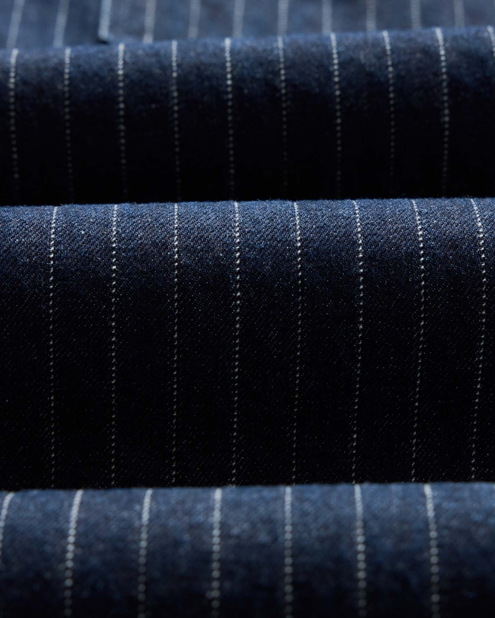 material shot of the fabric on The Mariner Jean in Rinsed Indigo Dobby Denim, Bottoms by Taylor Stitch