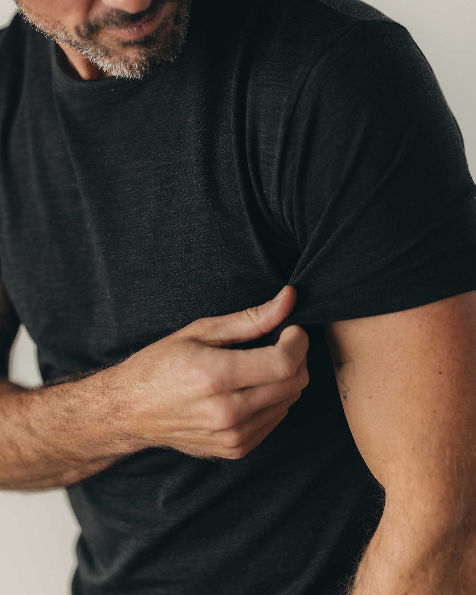fit model showing off The Merino Tee in Heather Black, Knits by Taylor Stitch