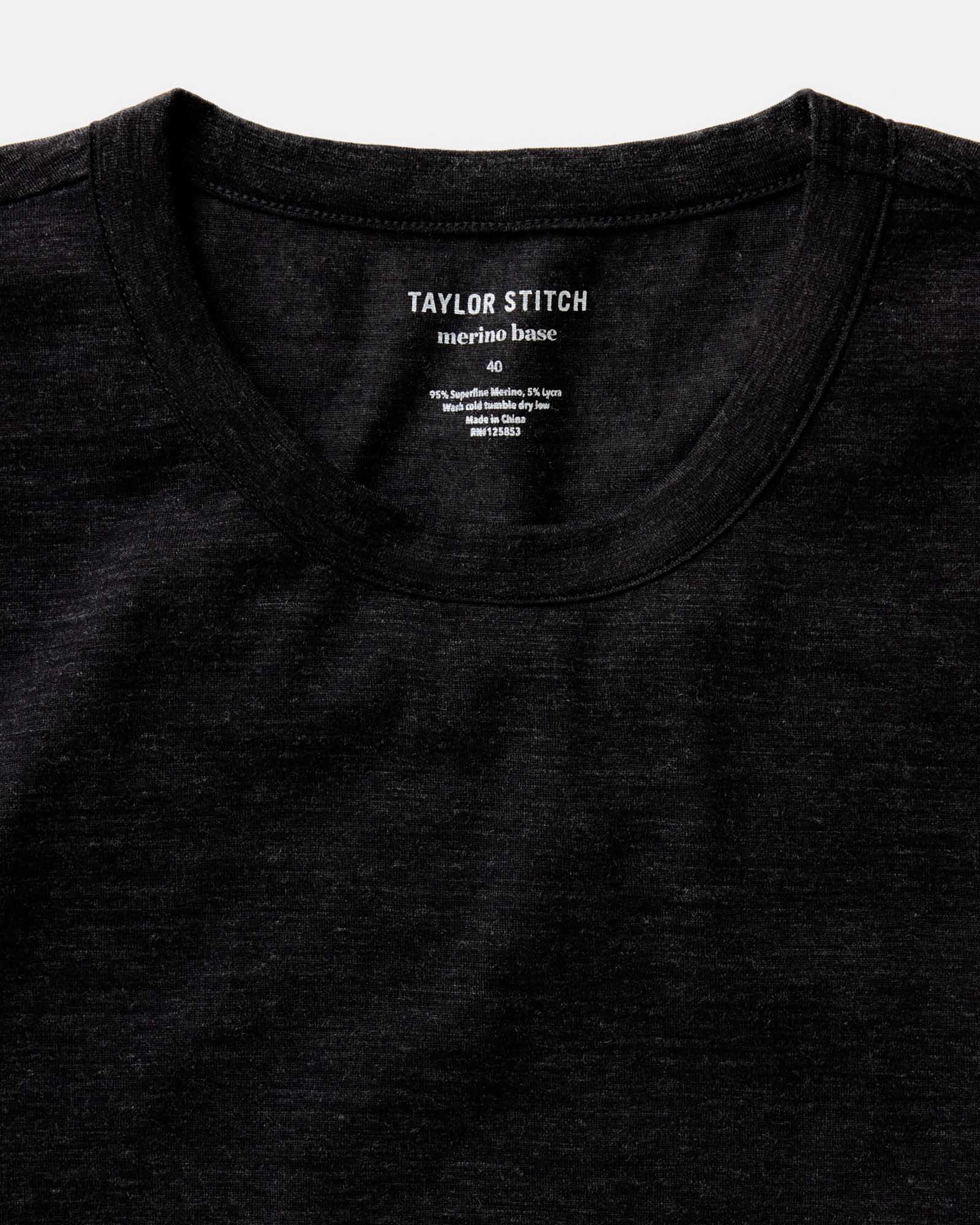 fit model posing in The Merino Tee in Heather Black, Knits by Taylor Stitch