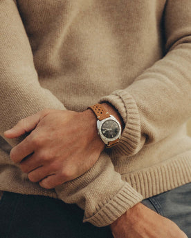 fit model showing off The Newton Sweater Polo in Heather Oatmeal, Knits by Taylor Stitch