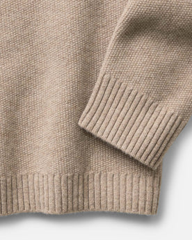 material shot of the sleeve on The Newton Sweater Polo in Heather Oatmeal, Knits by Taylor Stitch
