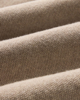 material shot of the fabric on The Newton Sweater Polo in Heather Oatmeal, Knits by Taylor Stitch
