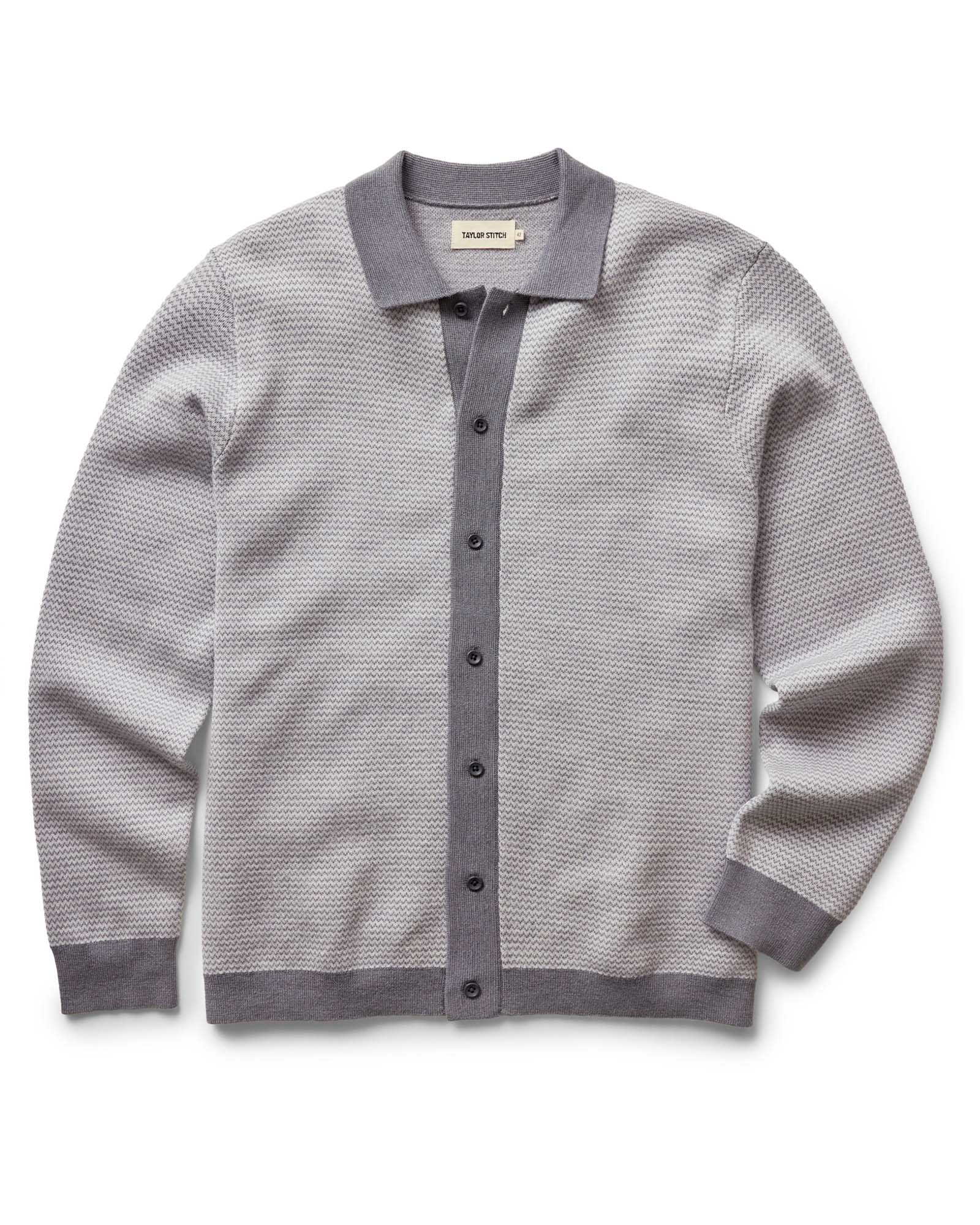 flatlay of The Nichols Polo in Heather Grey Birdseye Merino, Knits by Taylor Stitch