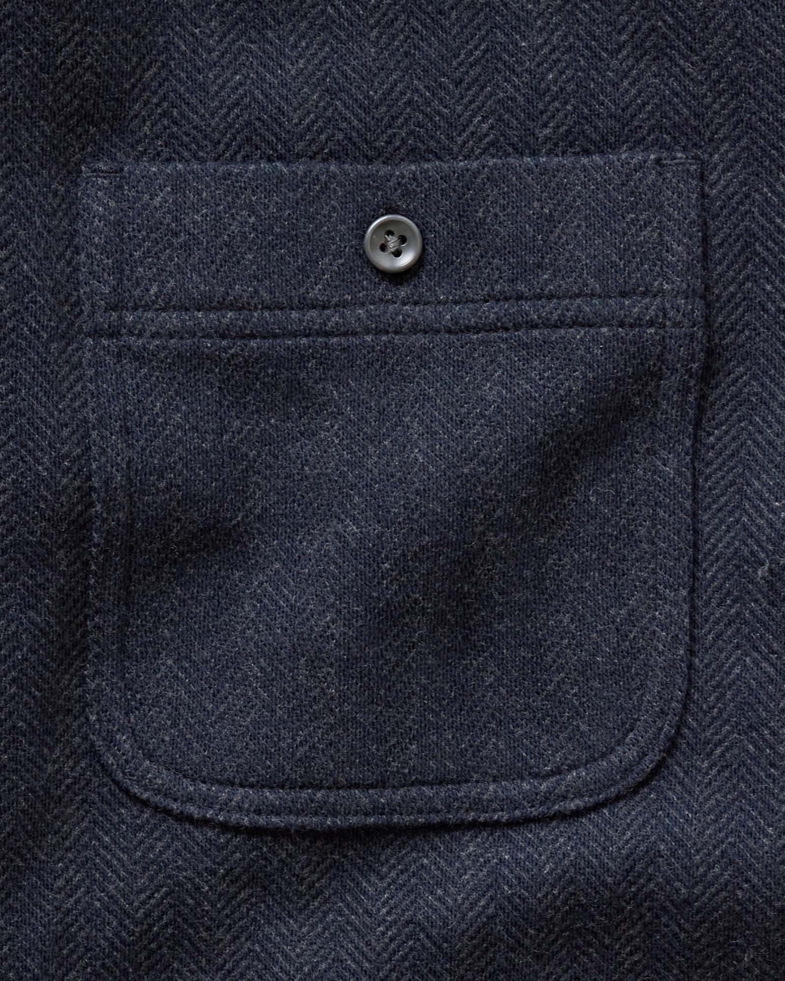 material shot of the pocket on The North Shore Knit Shirt in Heather Navy, Knits by Taylor Stitch