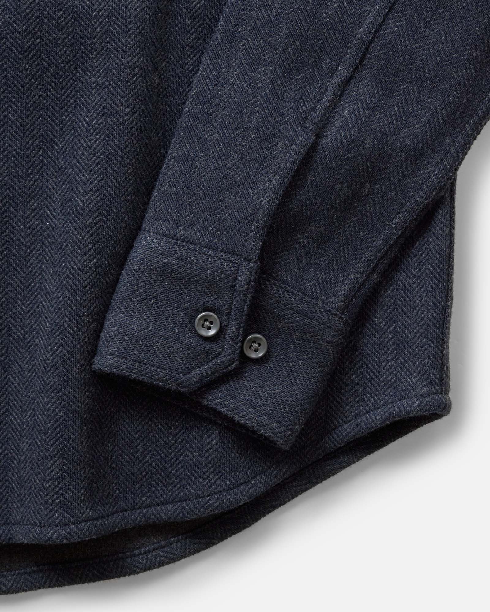material shot of the sleeve on The North Shore Knit Shirt in Heather Navy, Knits by Taylor Stitch