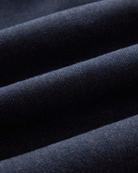 material shot of the fabric on The North Shore Knit Shirt in Heather Navy, Knits by Taylor Stitch