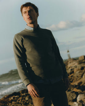 fit model posing in The Organic Cotton Crew in Deep Sea Waffle, Knits by Taylor Stitch