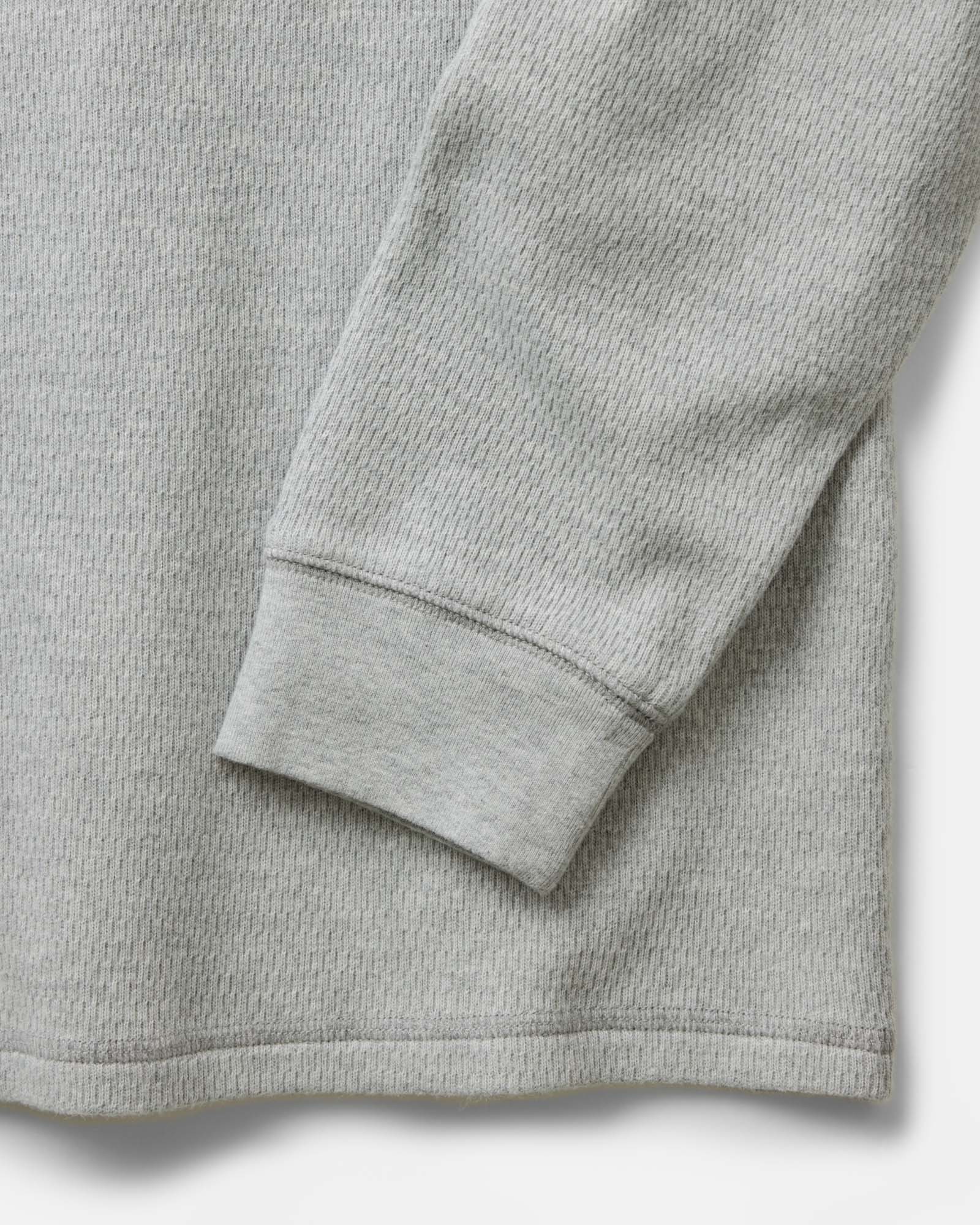 material shot of the sleeve on The Organic Cotton Crew in Heather Grey Waffle, Knits by Taylor Stitch