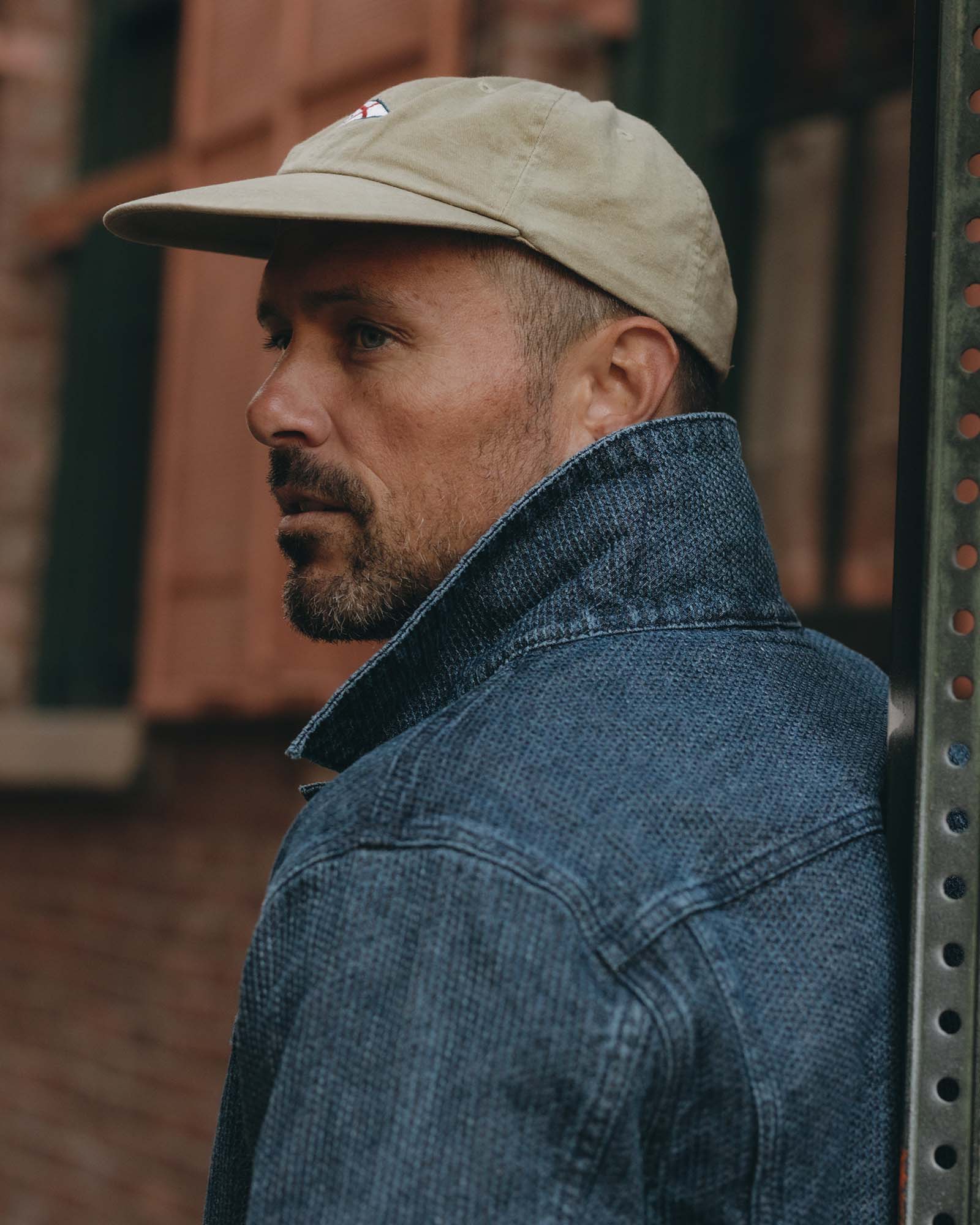 fit model showing off the collar on The Ryder Jacket in Japanese Washed Indigo Sashiko, Outerwear by Taylor Stitch