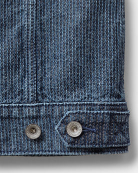 material shot of the buttons on The Ryder Jacket in Japanese Washed Indigo Sashiko, Outerwear by Taylor Stitch