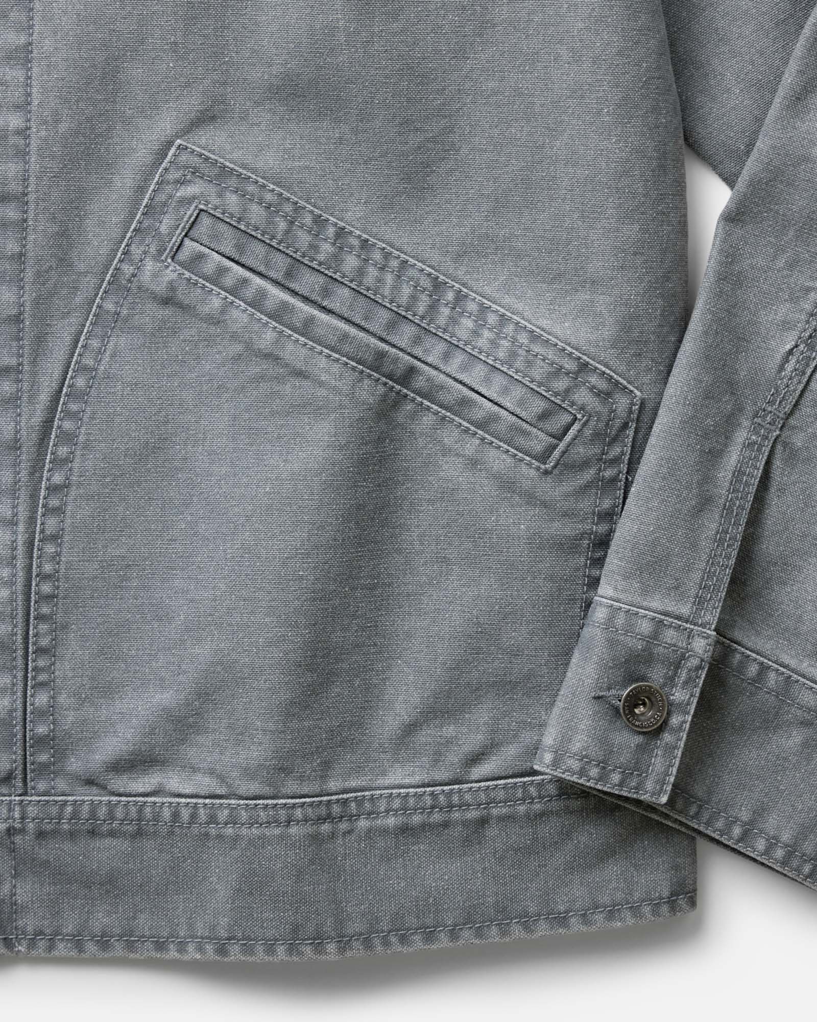material shot of the pocket on The Shifter Jacket in Dark Grey Pigment Canvas, Outerwear by Taylor Stitch