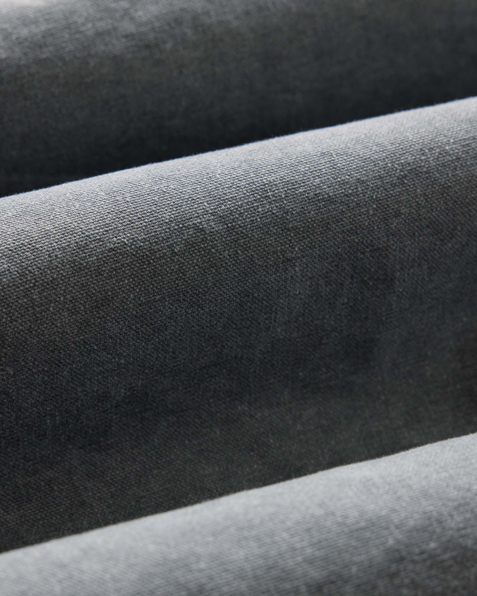 material shot of the fabric on The Shifter Jacket in Dark Grey Pigment Canvas, Outerwear by Taylor Stitch