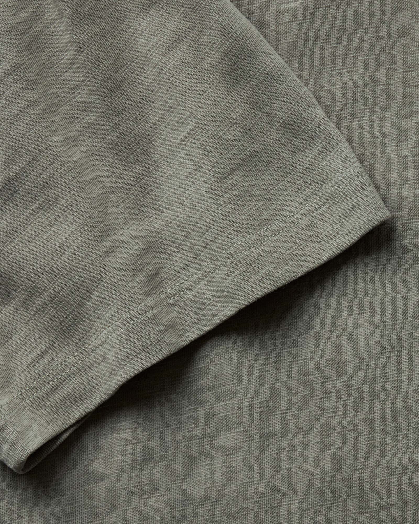 material shot of the sleeve on The Slub Tee in Smoked Olive, Knits by Taylor Stitch