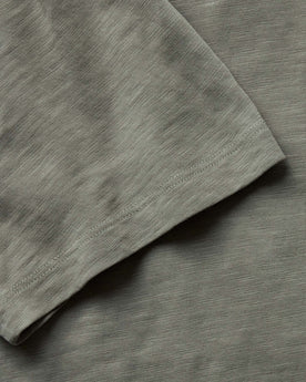 material shot of the sleeve on The Slub Tee in Smoked Olive, Knits by Taylor Stitch