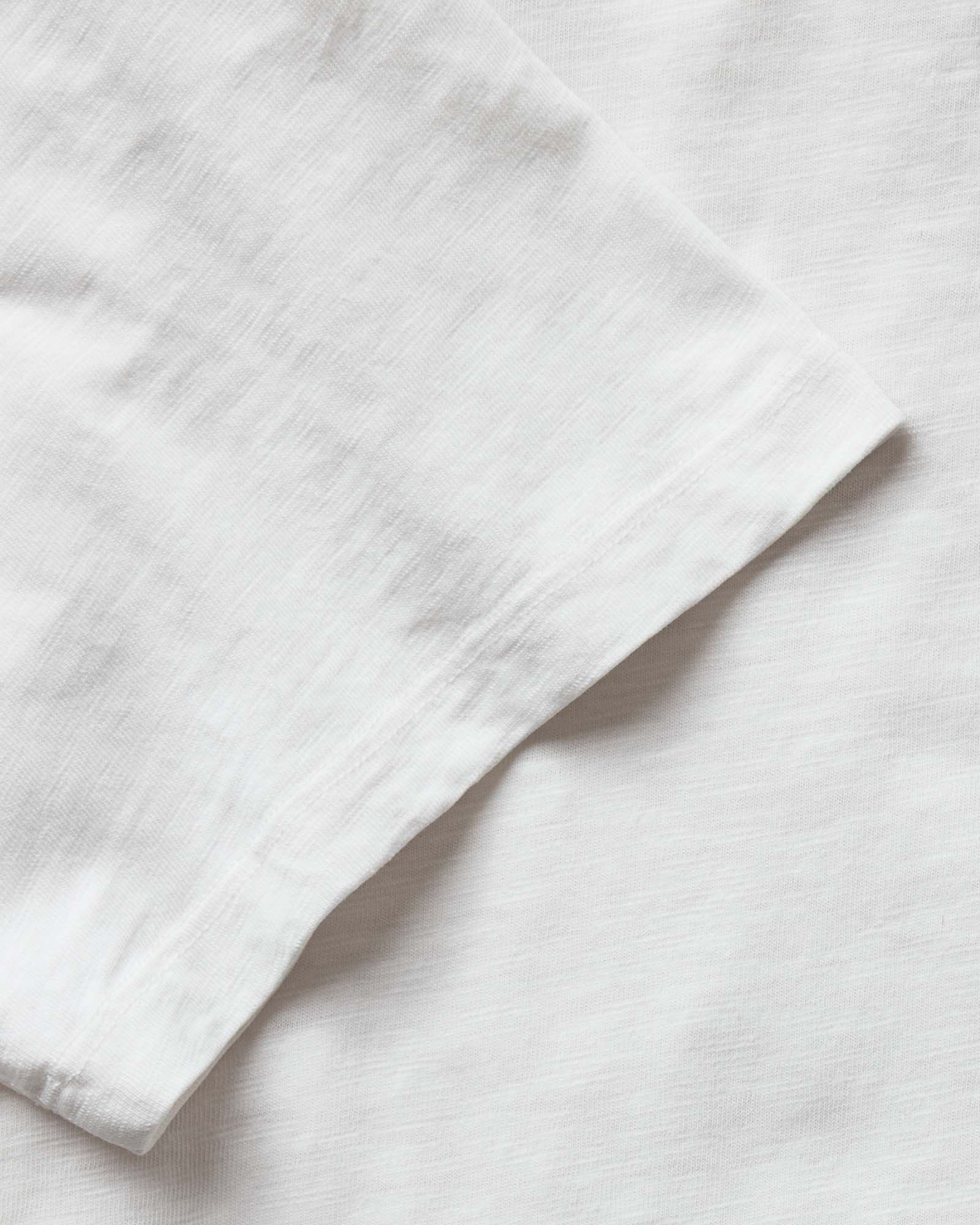 material shot of the cuff on The Slub Tee in White, Knits by Taylor Stitch