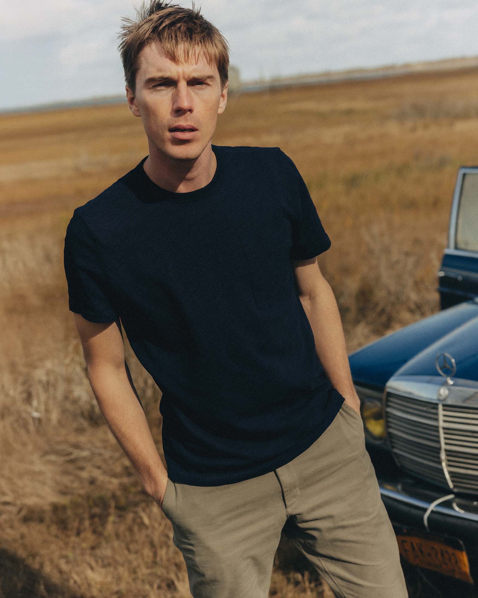 editorial image of The Organic Cotton Tee in Rinsed Indigo in a bin, Knits by Taylor Stitch