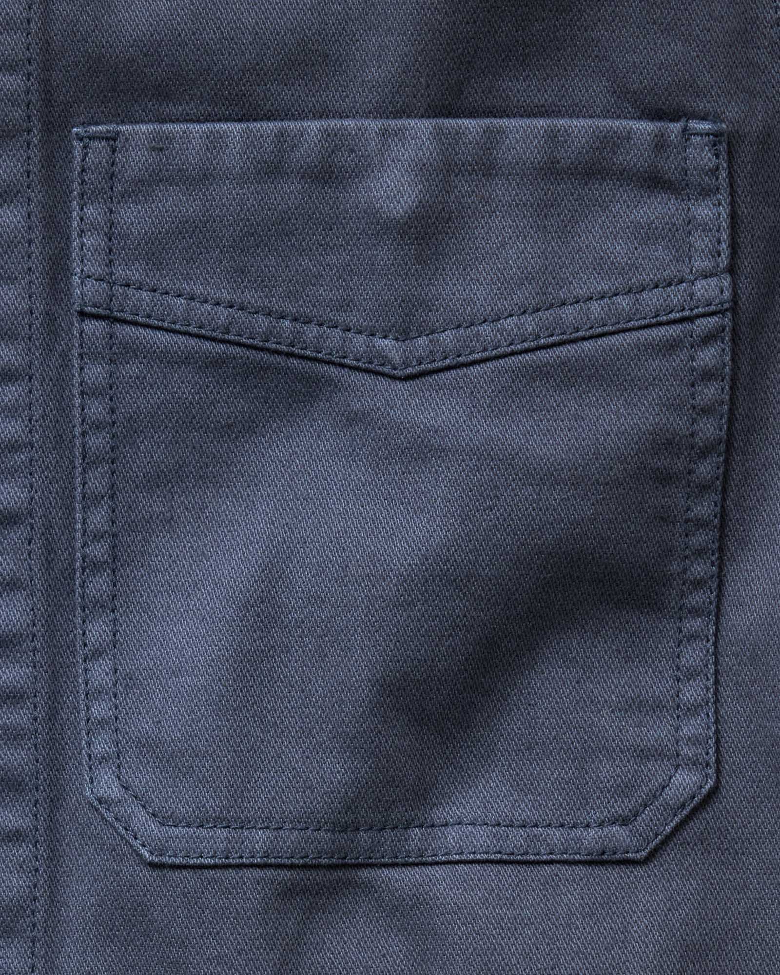 material shot of the pocket on The Station Jacket in Petrol Blue Broken Twill, Outerwear by Taylor Stitch