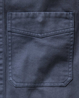 material shot of the pocket on The Station Jacket in Petrol Blue Broken Twill, Outerwear by Taylor Stitch