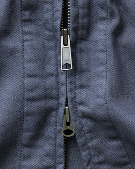 material shot of the zipper on The Station Jacket in Petrol Blue Broken Twill, Outerwear by Taylor Stitch