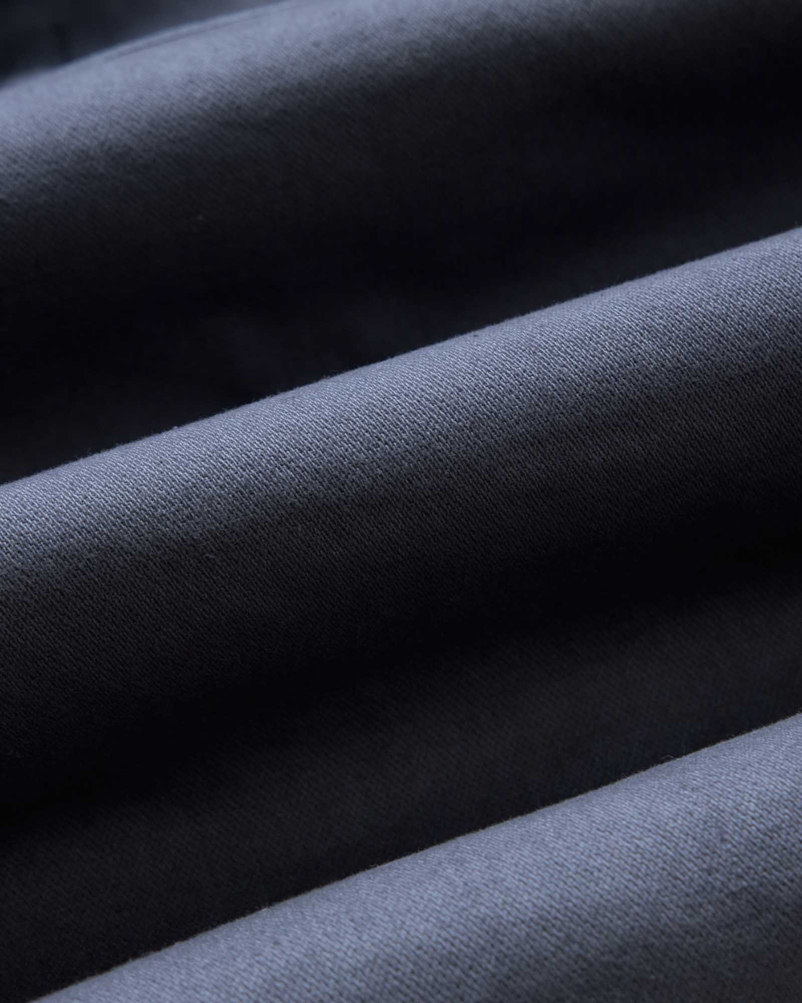 material shot of the fabric on The Station Jacket in Petrol Blue Broken Twill, Outerwear by Taylor Stitch