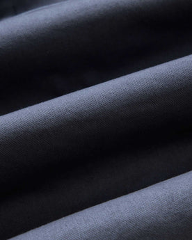 material shot of the fabric on The Station Jacket in Petrol Blue Broken Twill, Outerwear by Taylor Stitch