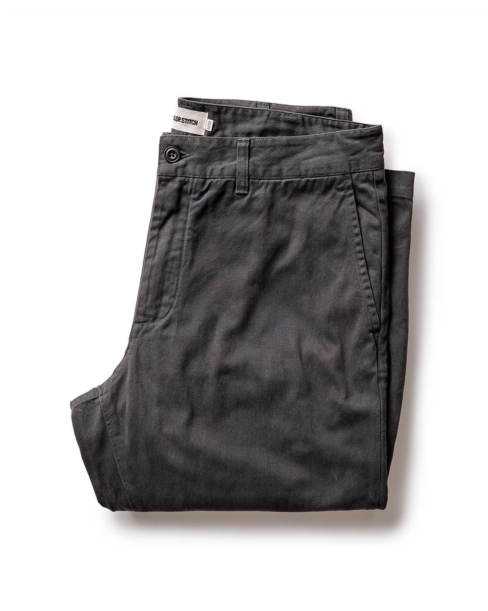 folded flatlay of The Straight Foundation Pant in Organic Faded Black, Bottoms by Taylor Stitch