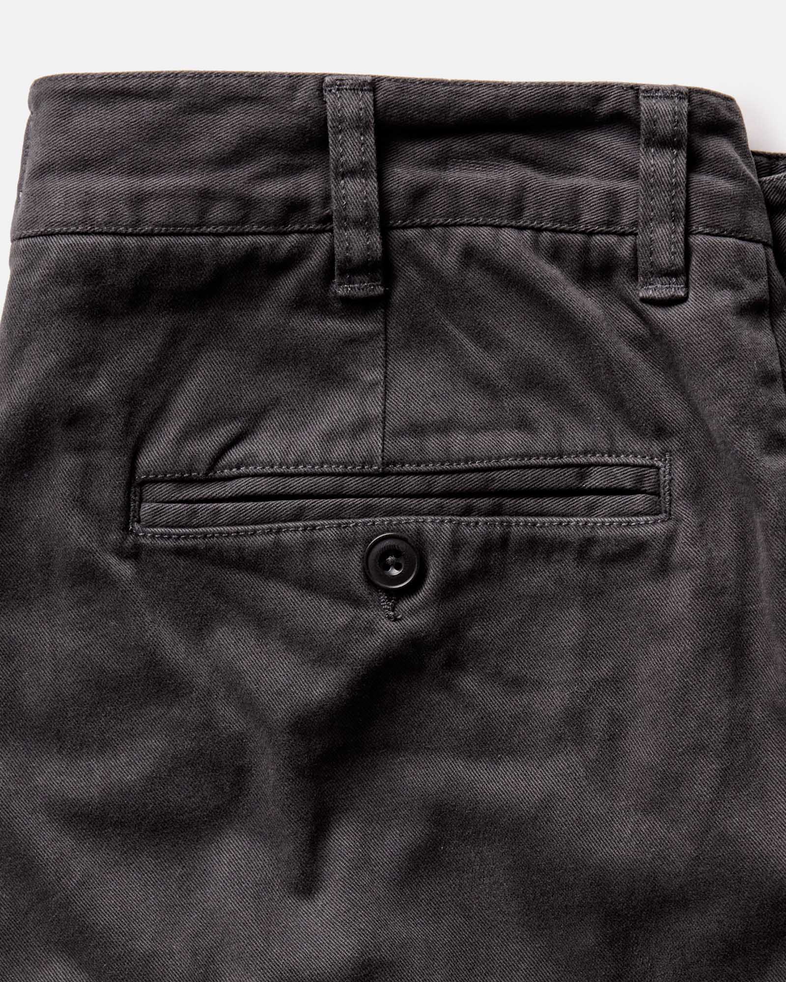 material shot of the back pocket on The Straight Foundation Pant in Organic Faded Black, Bottoms by Taylor Stitch