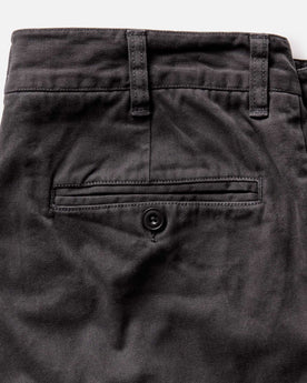 material shot of the back pocket on The Straight Foundation Pant in Organic Faded Black, Bottoms by Taylor Stitch